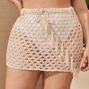 Tan swim skirt cover up.